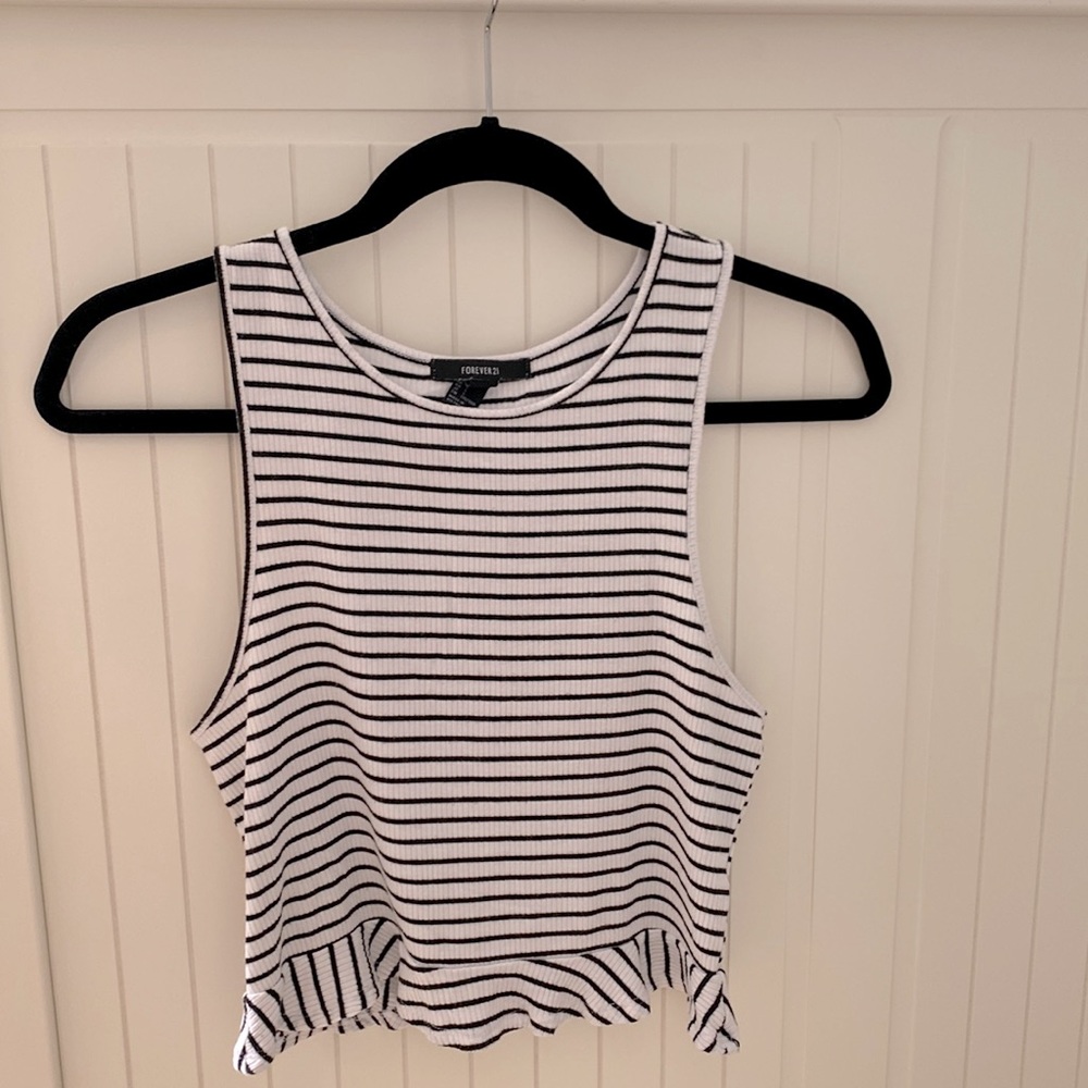 Cute Forever 21 black and white ruffle tank. Size L
